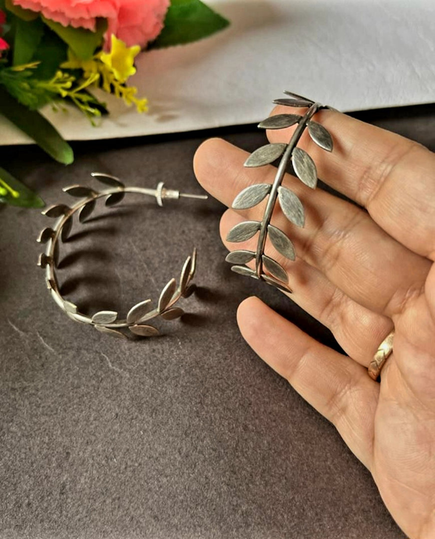 Ekani Jasmine Trendy Silver-toned Fern Leaf Metallic Hoop Earrings