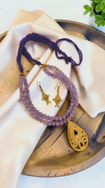 Load and play video in Gallery viewer, Premium Original Lavender Onyx Beaded Necklace Set with Handcrafted Dokra Pendant &amp; Fish Design Earrings | Adjustable Tassel