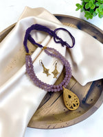 Load image into Gallery viewer, Premium Original Lavender Onyx Beaded Necklace Set with Handcrafted Dokra Pendant &amp; Fish Design Earrings | Adjustable Tassel