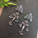 Load image into Gallery viewer, Ekani Rubani Tribal Contemporary Silver Lookalike Brass Leaf Motif Dangler Earrings
